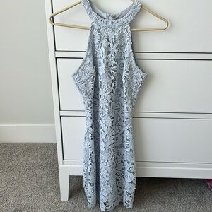 Light blue lace mini dress. Halter neck.